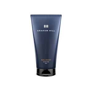 Transparentes MALMEDY Shaving Gel von GRAHAM HILL in einer dunkelblauen 150-ml-Tube mit schwarzem Verschluss