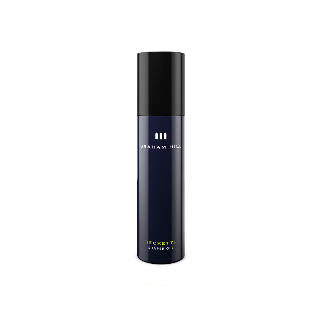 Stark festigendes BECKETTS Shaper Gel von GRAHAM HILL in einer dunkelblauen 100-ml-Flasche mit schwarzem Verschluss.